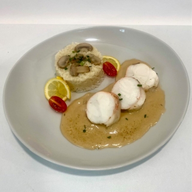 Médaillon de langouste sauce aux crustacés